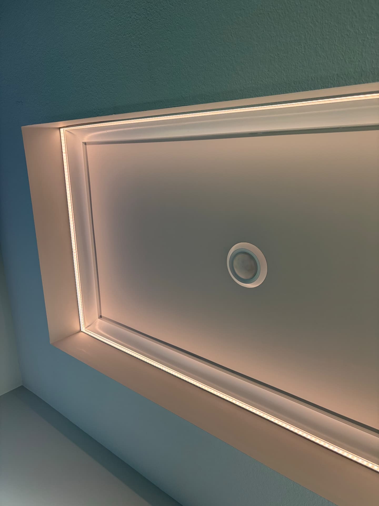 Cove LED lighting in a ceiling tray installed by ZV Electric