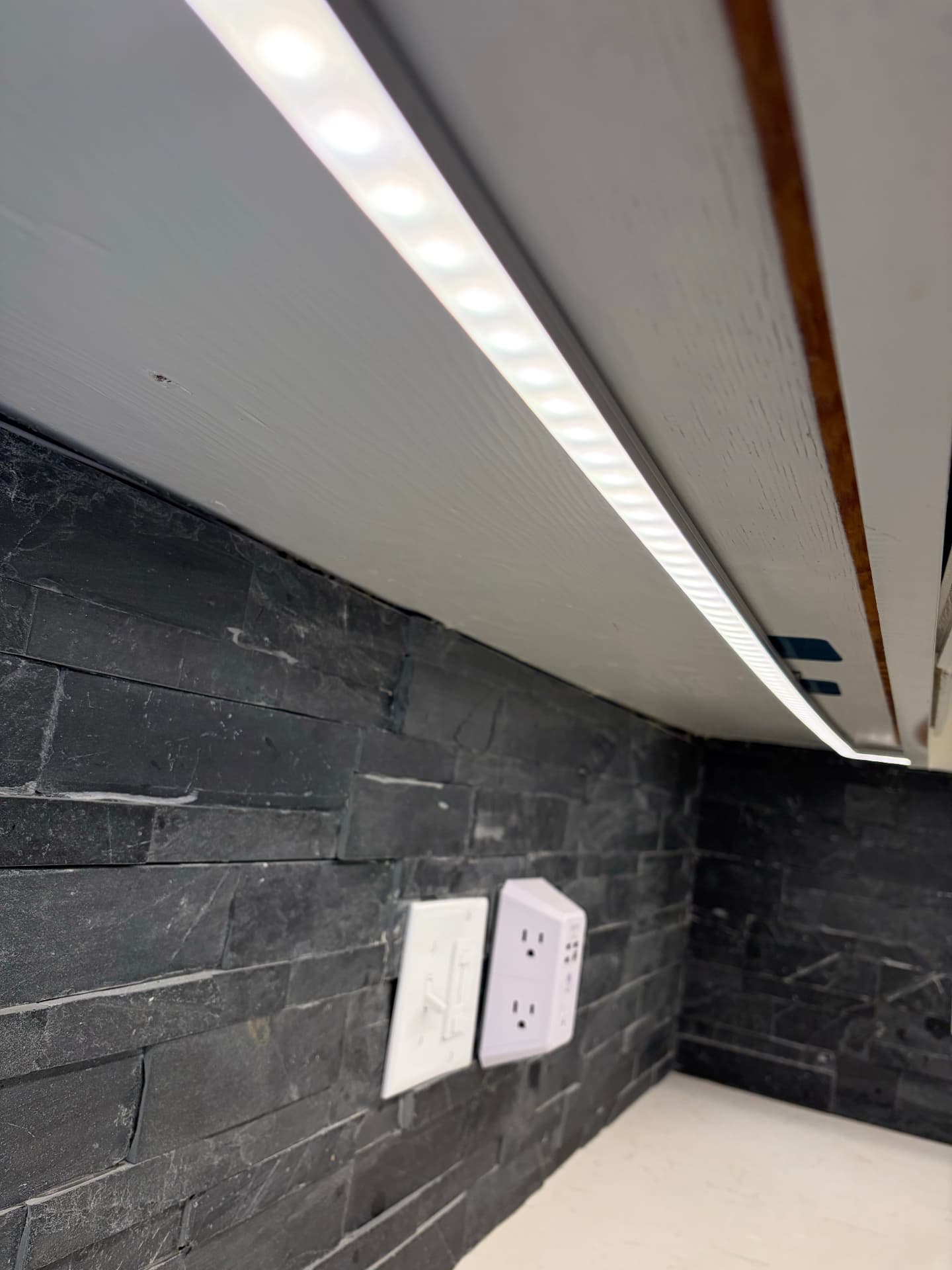 Under-cabinet LED strip lighting detail by ZV Electric